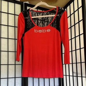 bebe Red Top with Black Lace Yoke and Rhinestone Logo